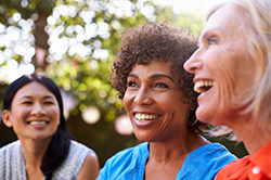 three women laughing