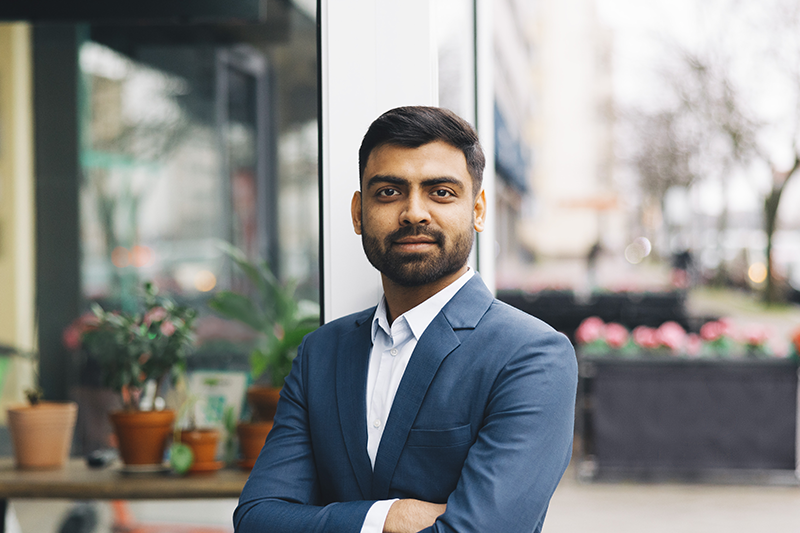 man standing and looking at camera