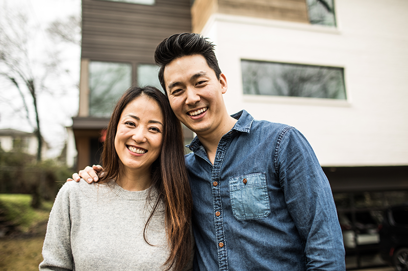 couple smiling and looking at camera