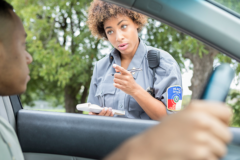 police officer talking to driver