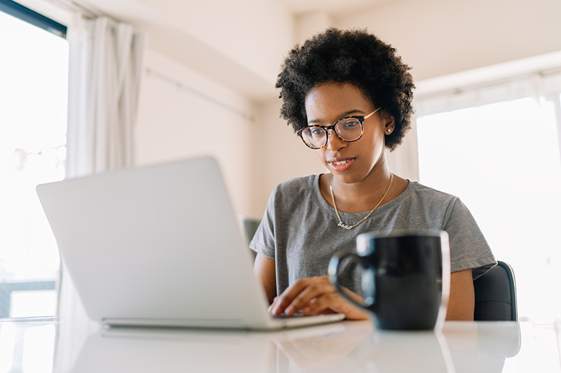 woman looking at computer