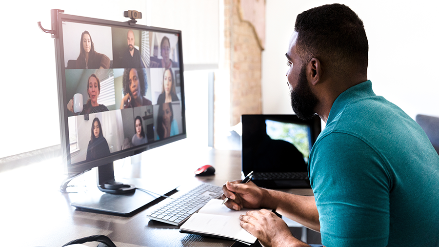 man at computer on virtual conference call