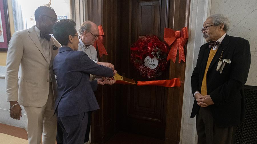 Photo of people in a ribbon cutting ceremony