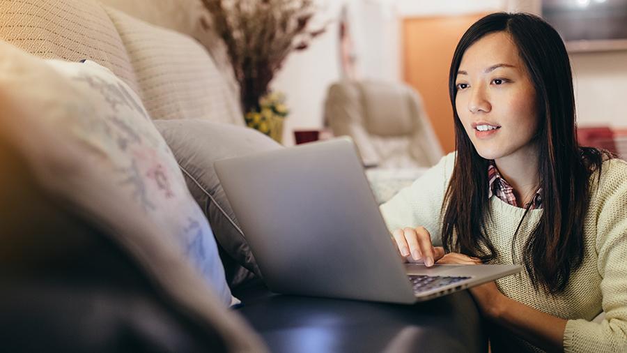 Young woman looking at computer